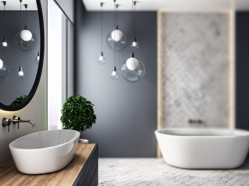 Luxury grey bathroom interior with decorative tile wall, bath tub and lamps. 3D Rendering